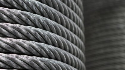 Steel Wire Rope on a reel A close up of steel wire rope as it is wrapped around a reel in a circular fashion