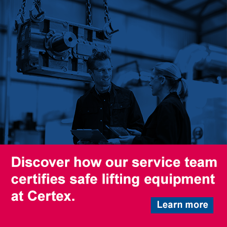 Service team certifying safe lifting equipment
